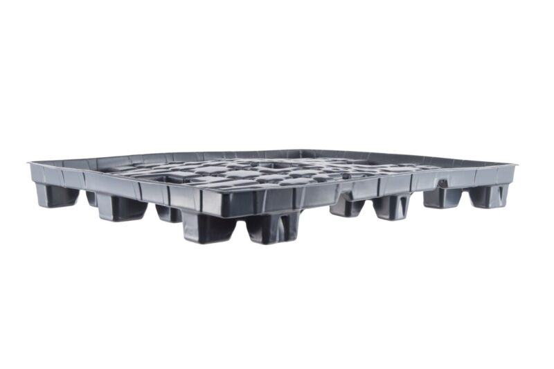 A plastic pallet with compartments.