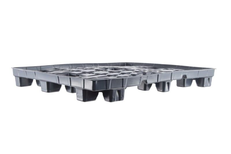 A plastic pallet with compartments.