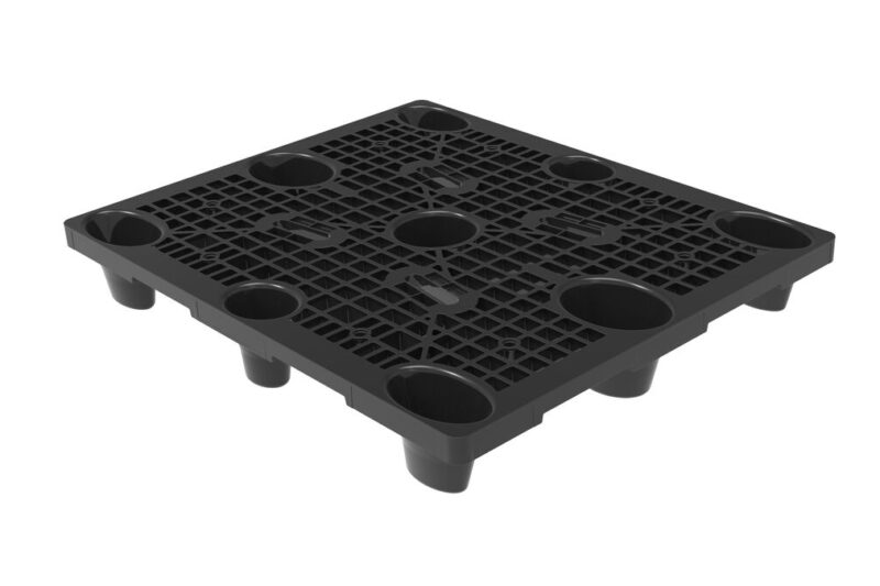 A black plastic pallet with four holes.