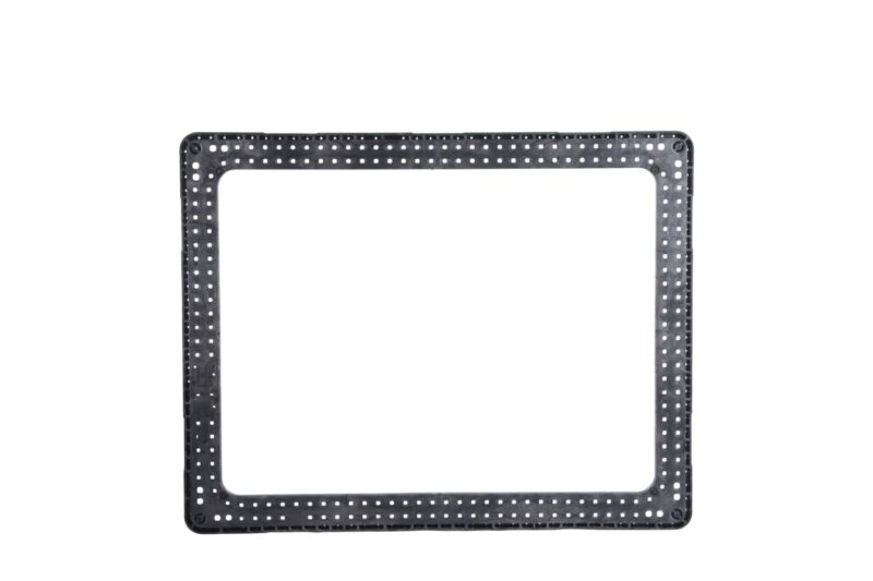 A square plastic pallet with holes on a white background.