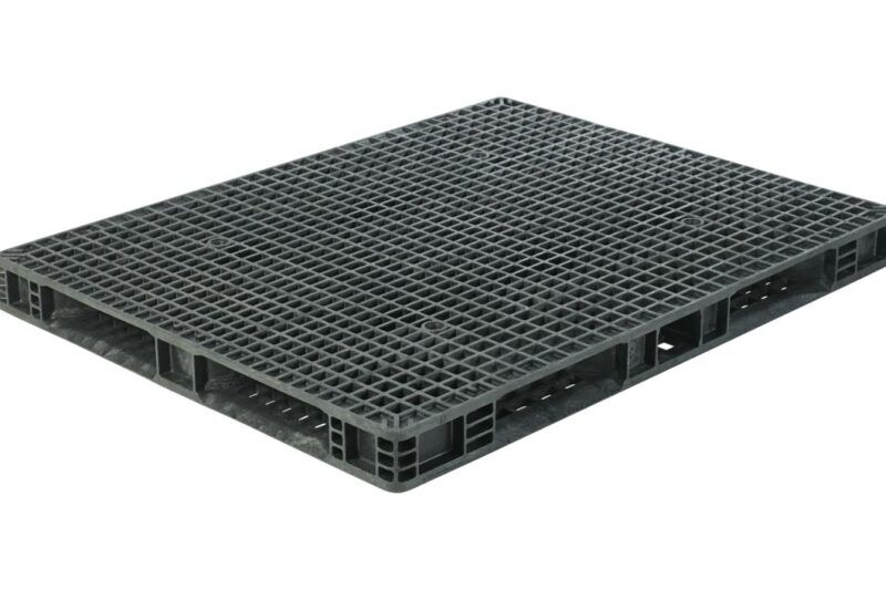 A black plastic pallet on a white background.