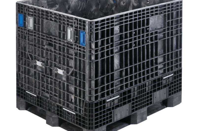 The GP4048-39 is a large black plastic pallet box with grid-pattern sides and blue ID panels, designed for industrial storage and transport, shown on a white background.