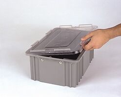 A person is lifting the clear lid of a gray plastic storage container.